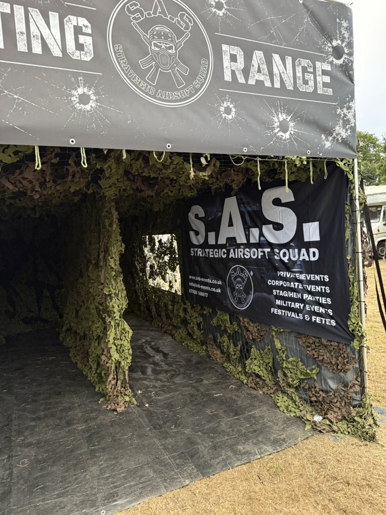 The S.A.S. Strategic Airsoft Squad banner on the range